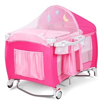 Costzon 4 in 1 Pink Pack and Play with Bassinet, Portable Baby Playard with Adjustable Canopy, Side Zipper Entrance, Music Box, Wheels/Brake, Foldable Infant Pink Bassinet for Baby Girl Toddlers