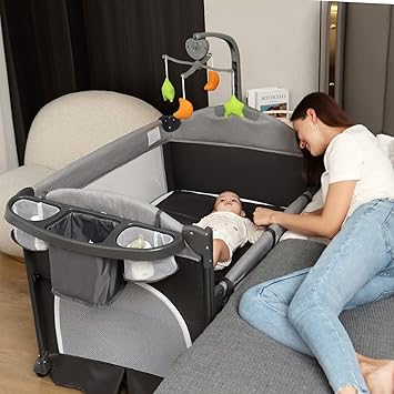 Baby Bedside Sleeper Bassinet, 4-in-1 Pack and Play with Bassinet w/Diaper Changing Table & Storage Bag, 3 Adjustable Heights, Toy Arch & Music, Portable Baby Play Yard with Carry Bag